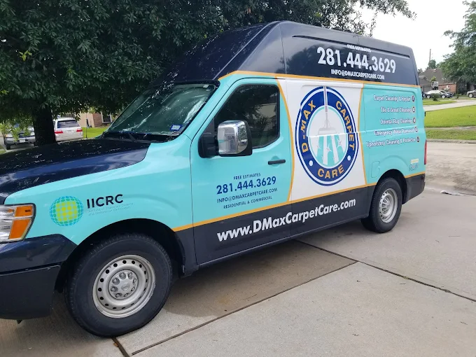 D-Max Carpet Care baby-blue and navy service van